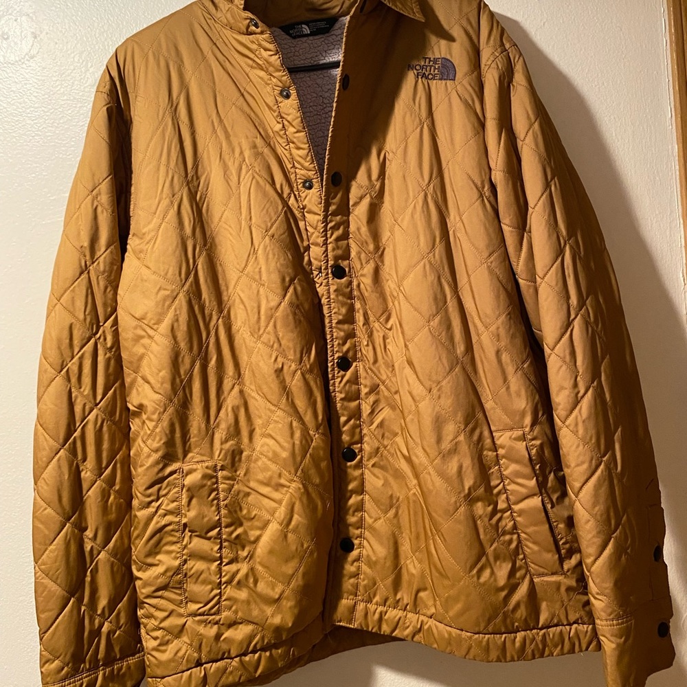 Tan/gold size medium north face jacket